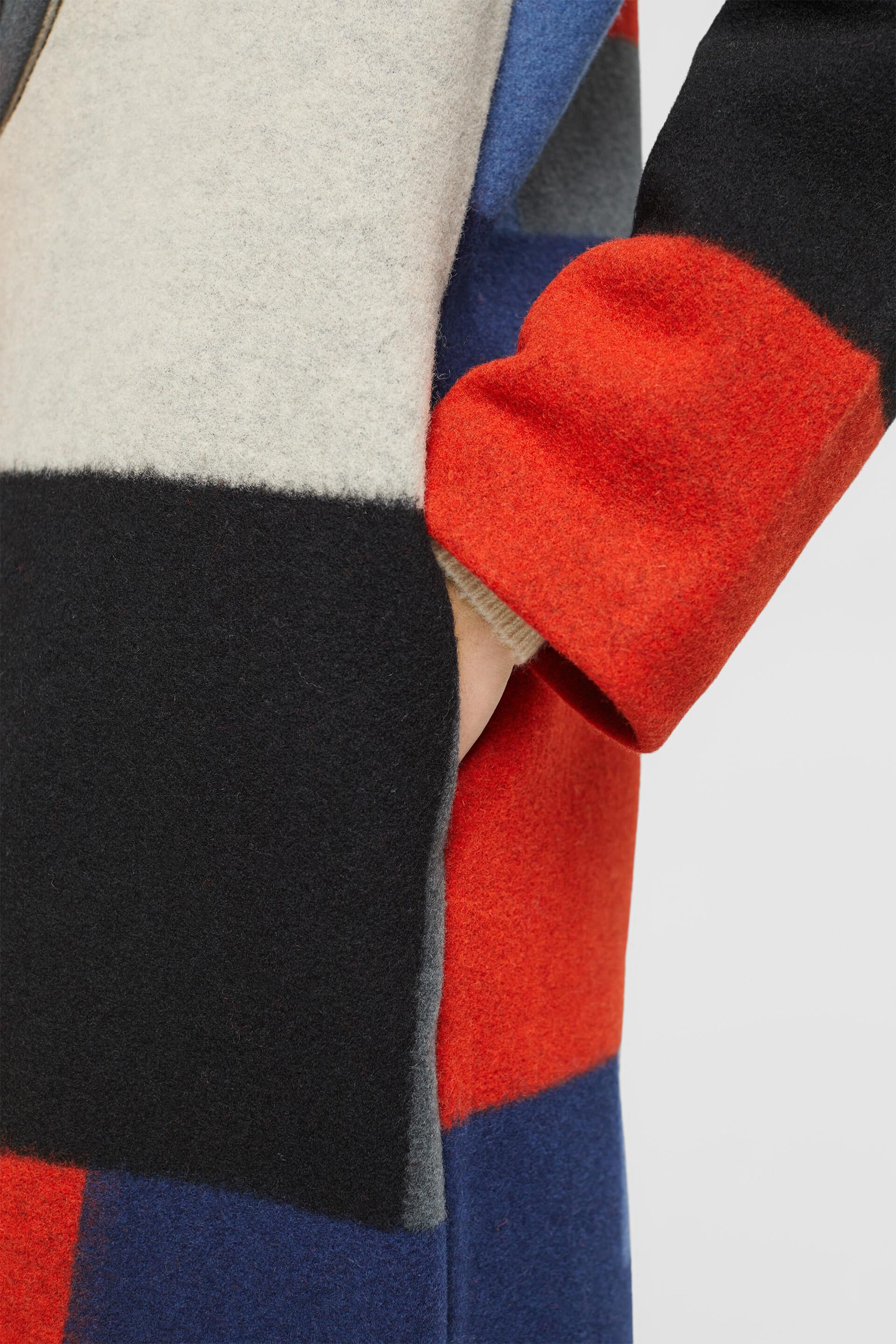 Manteau en laine mélangée animé d’un motif colour blocking