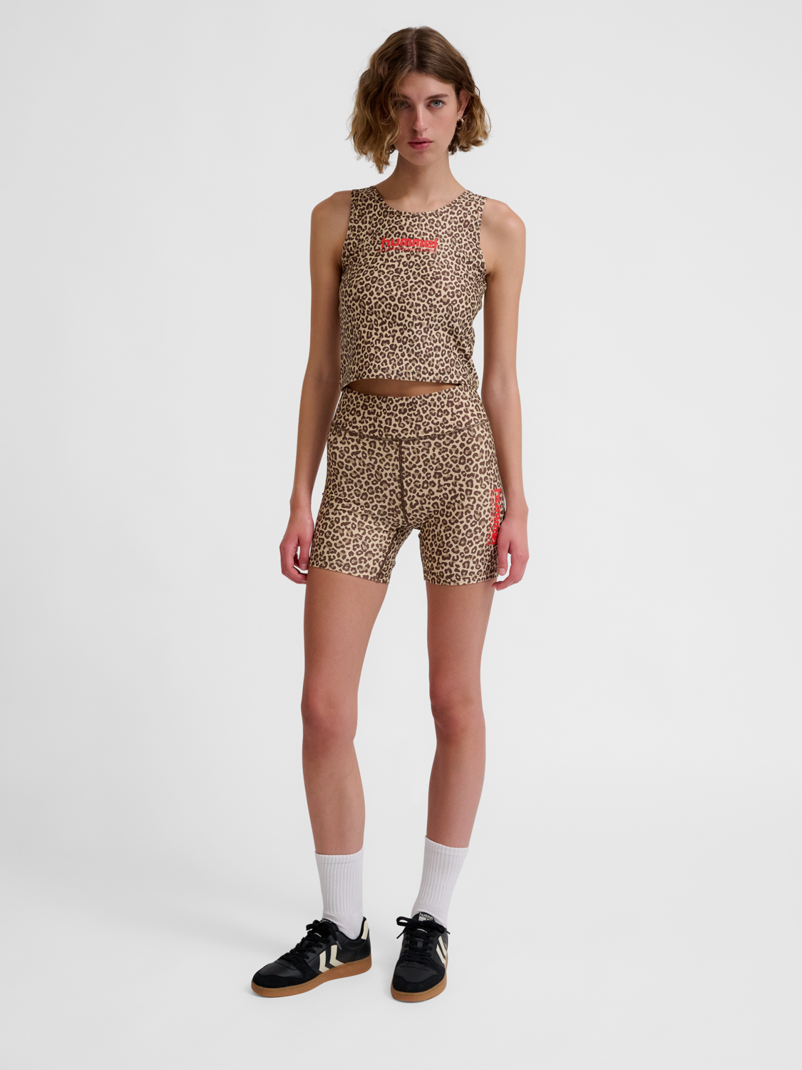 hmlFAST MID WAIST TIGHT SHORTS