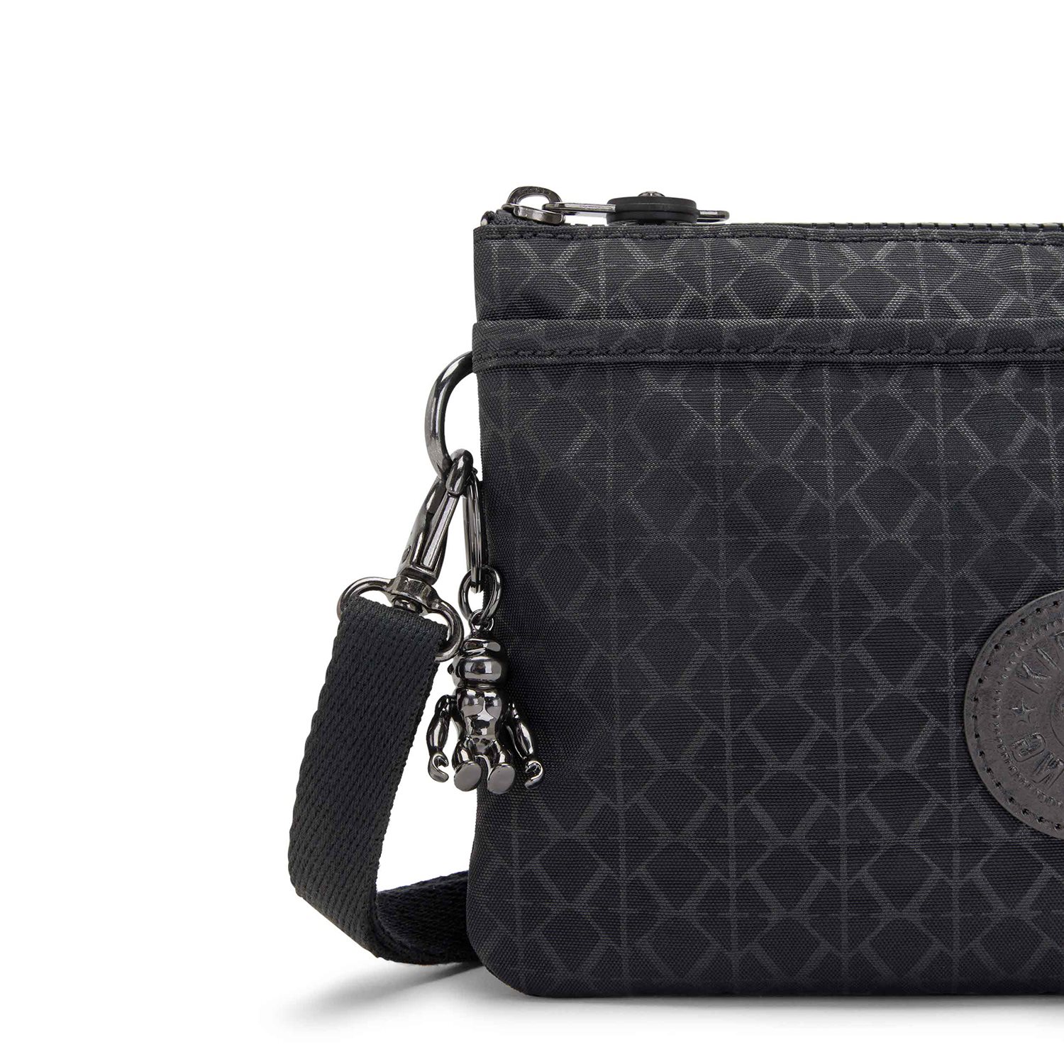 Kipling Riri signature emb