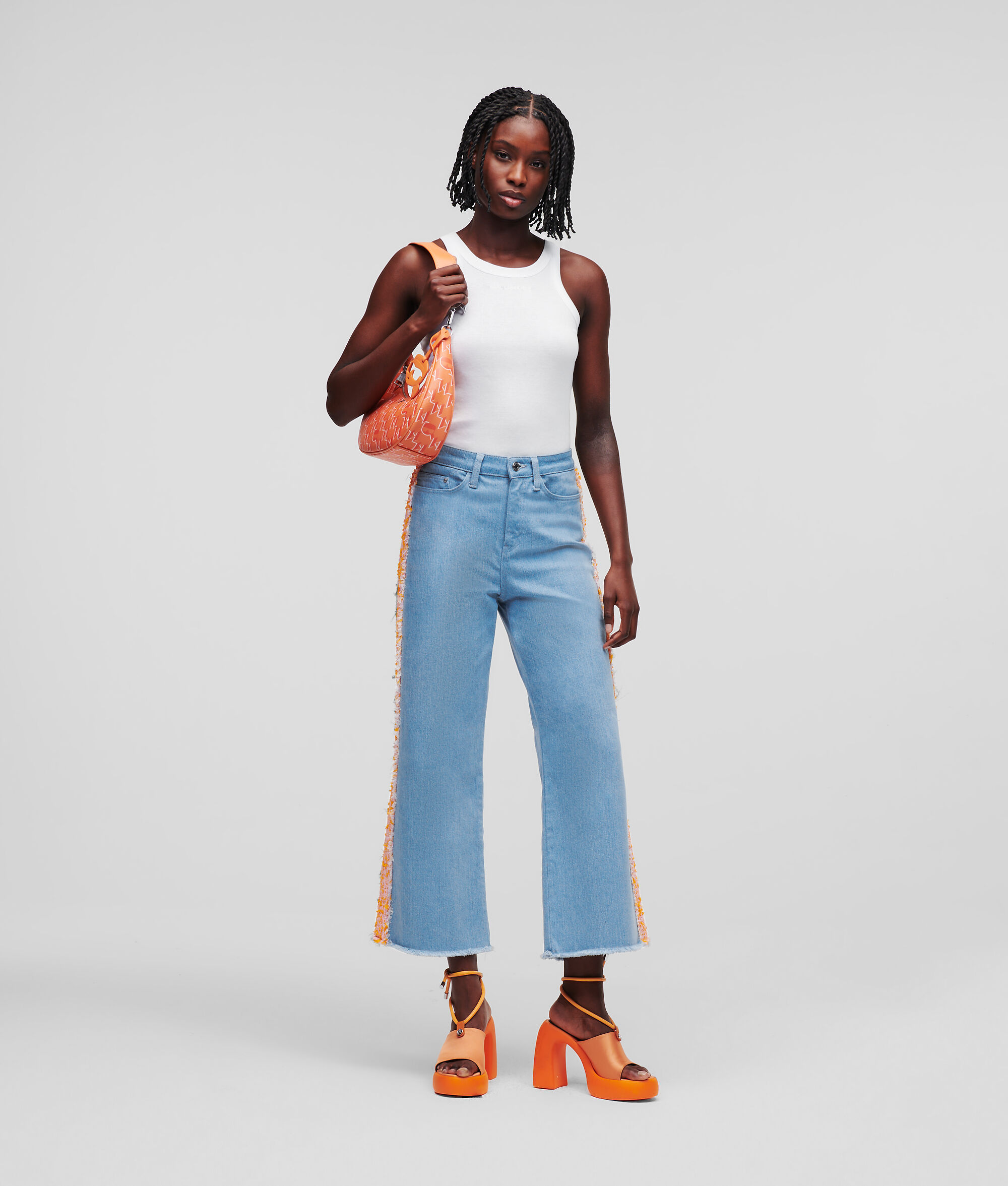JEAN EN DENIM ET TISSU BOUCLÉ