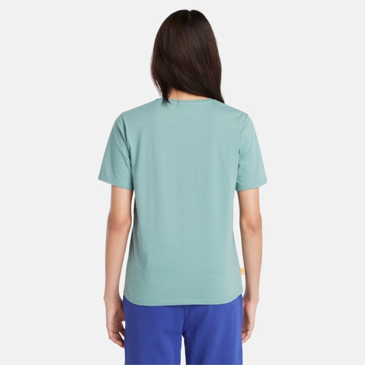 Camiseta feminina Exeter River na cor verde-azulada.