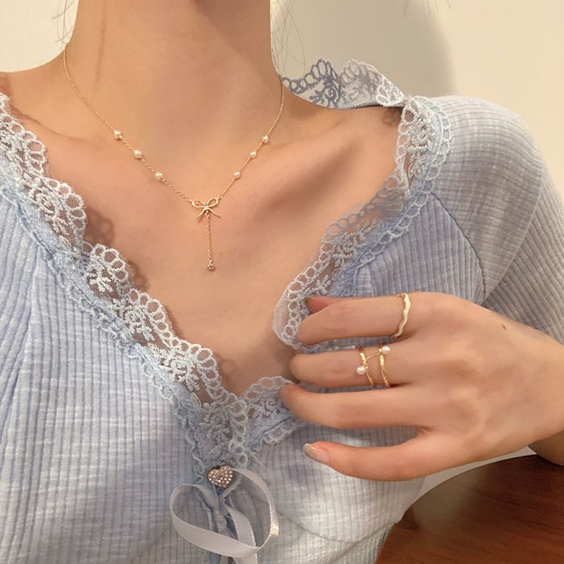 LIVSIA - Ketting met strik en nepparels