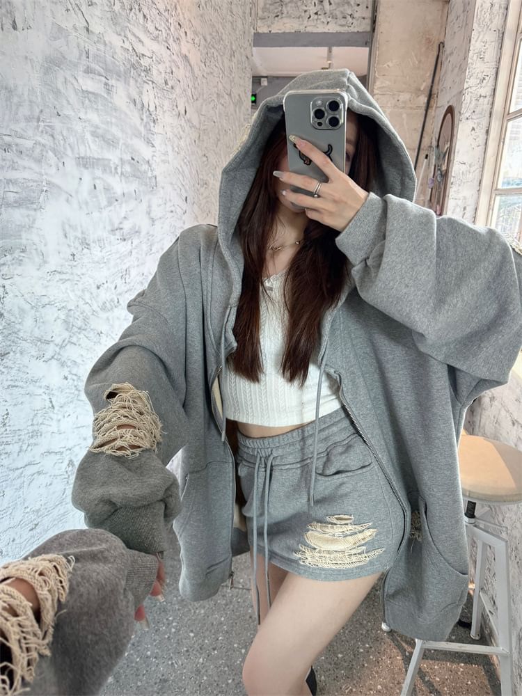 Trendycas - Effen distressed hoodie met rits / mini-kokerrok met trekkoord in de taille