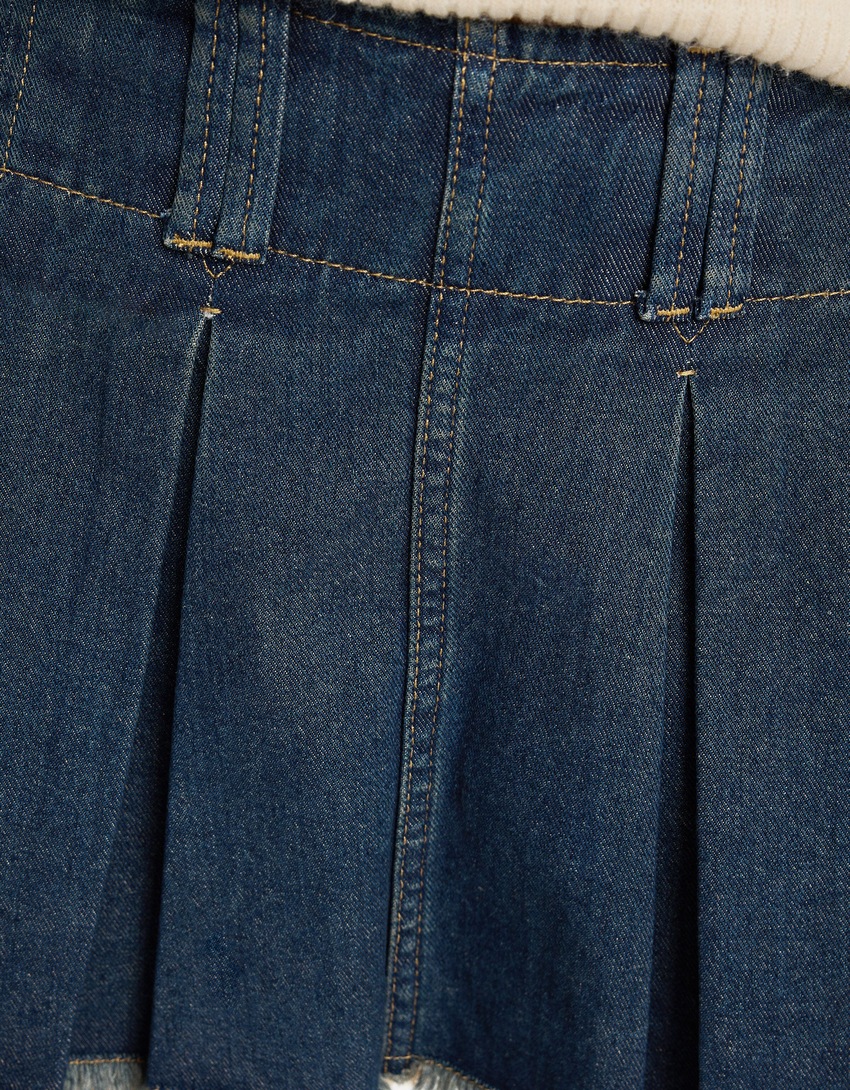 saias-calça plissadas em denim desbotado