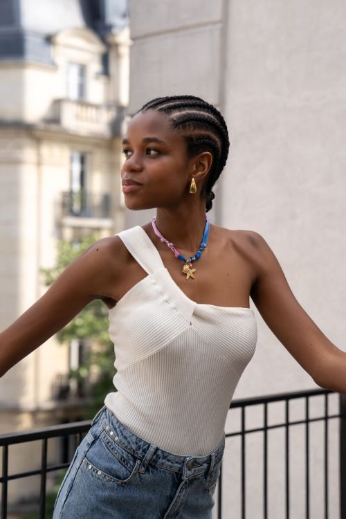 Witte one-shoulder top met gedraaid effect