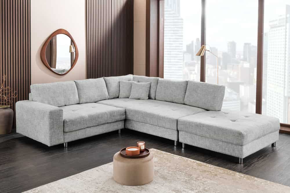 Moderne Wohnlandschaft KENT 220cm grau Strickstoff Ecksofa inkl. Hocker und Kissen