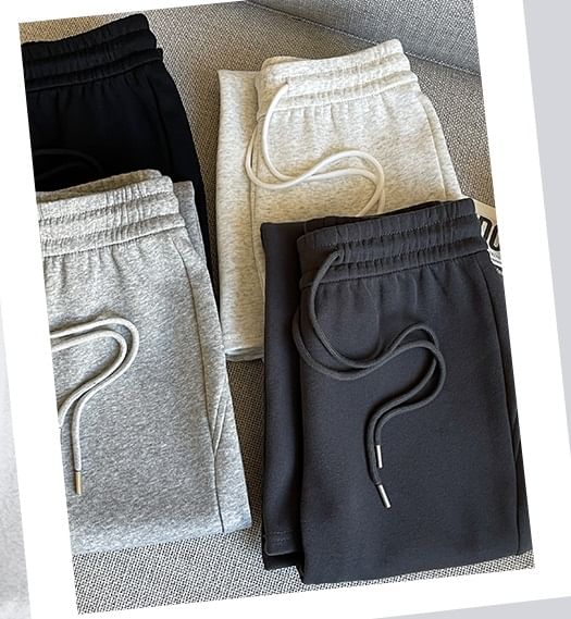 evanesce - Bootcut joggingbroek met trekkoord in de taille