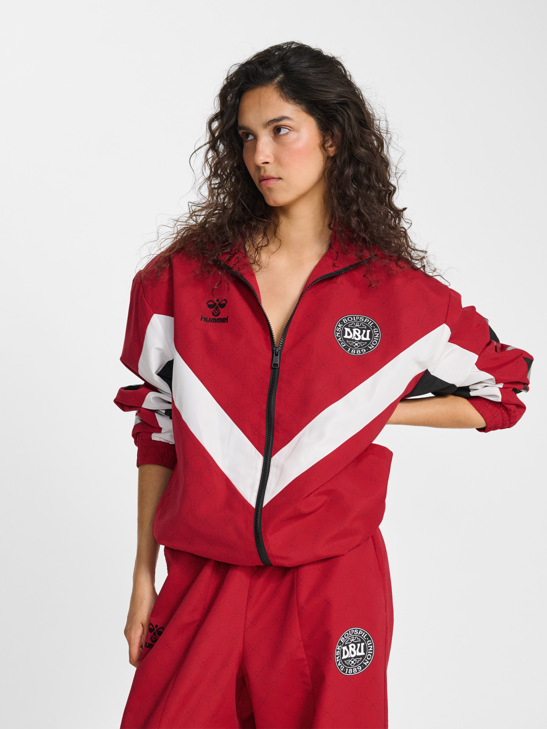 hmlTRACKSUIT JACKET DBU ROTATE