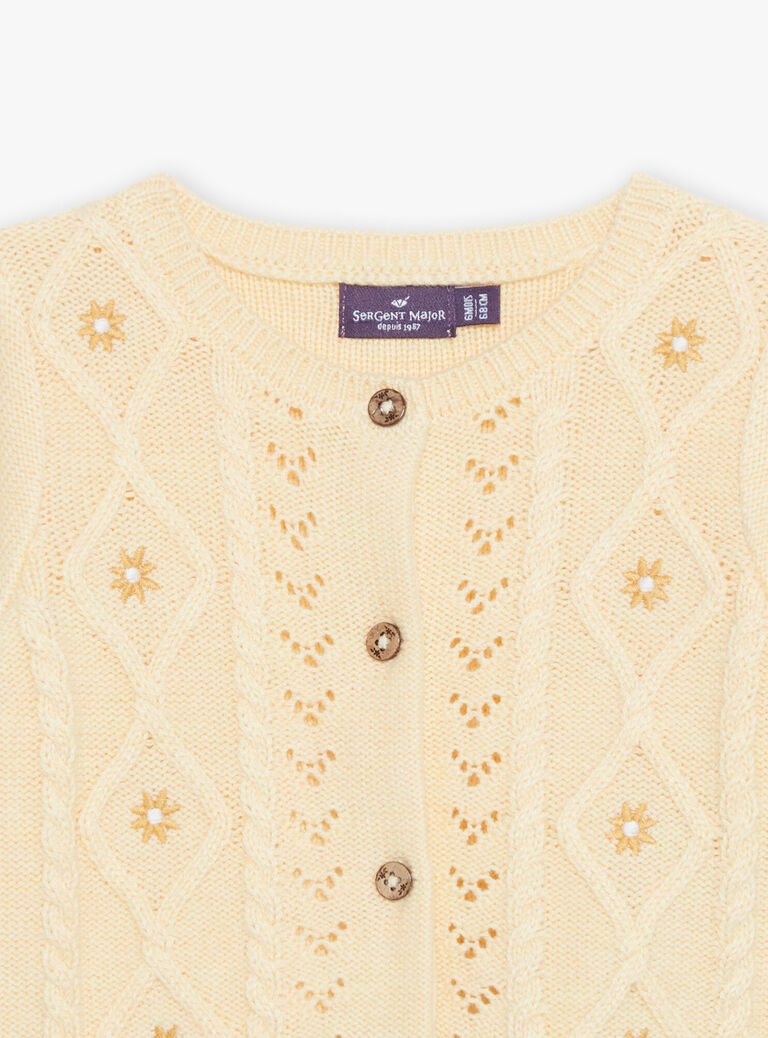Cardigan en tricot ajouré et torsadé jaune pastel