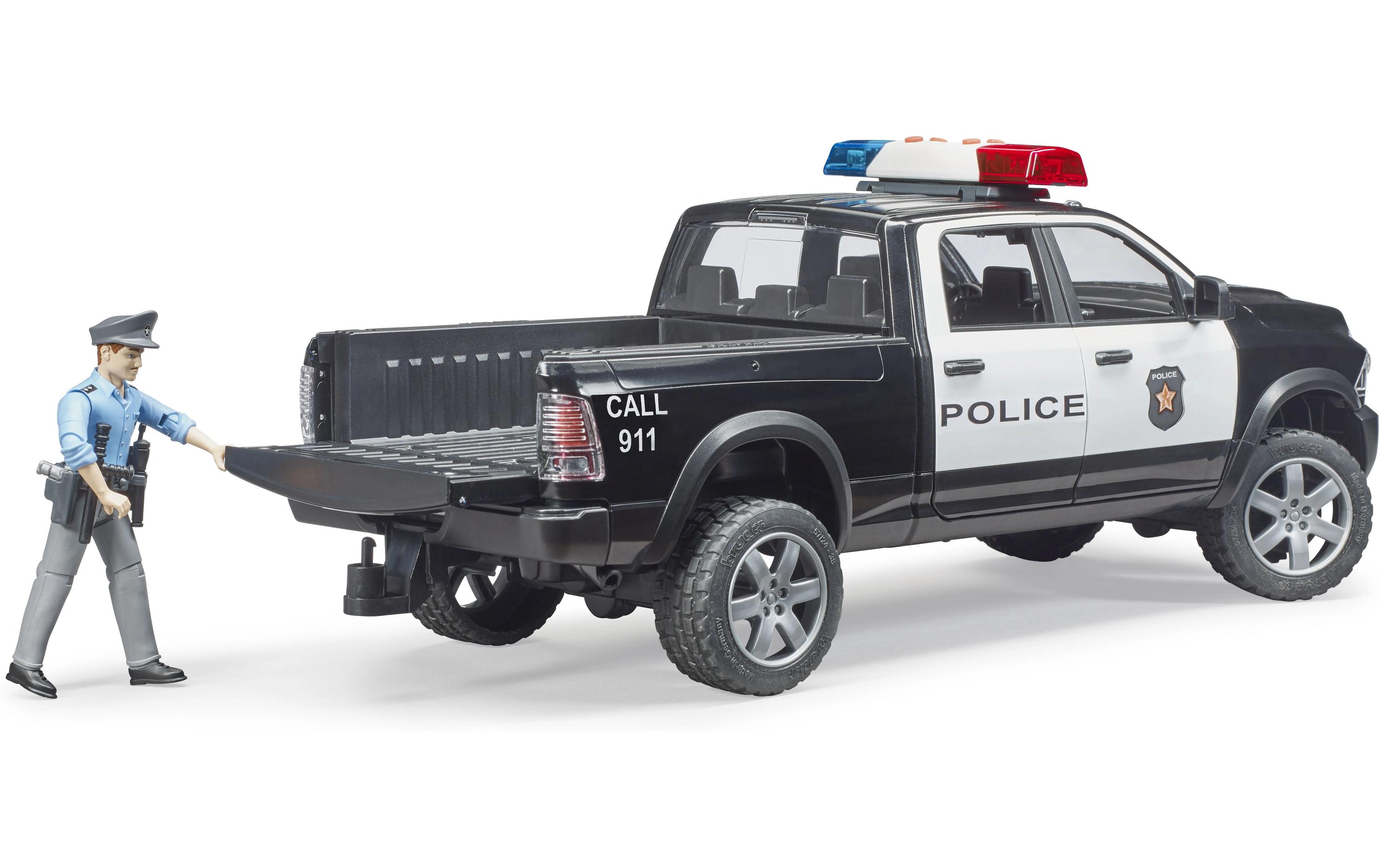 Polizei Pickup mit PolizistPolizeifahrzeug