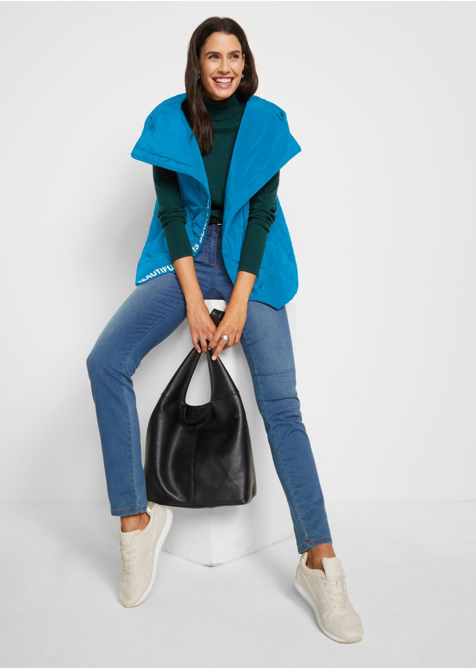 Veste matelassée sans manches asymétrique