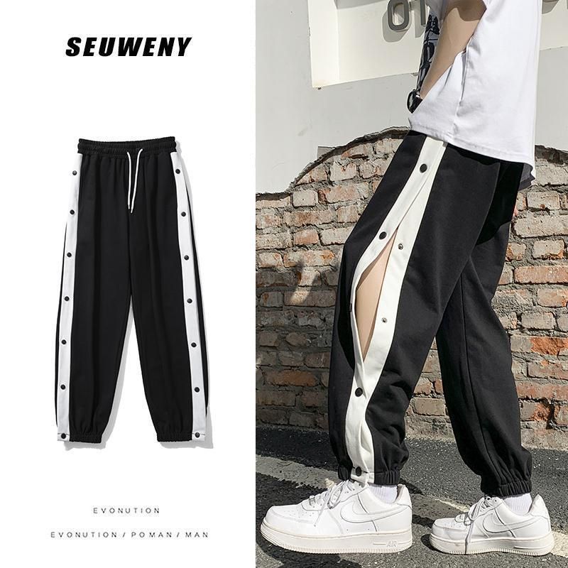 Wewewow - Cropped joggingbroek met knoopjesaccent