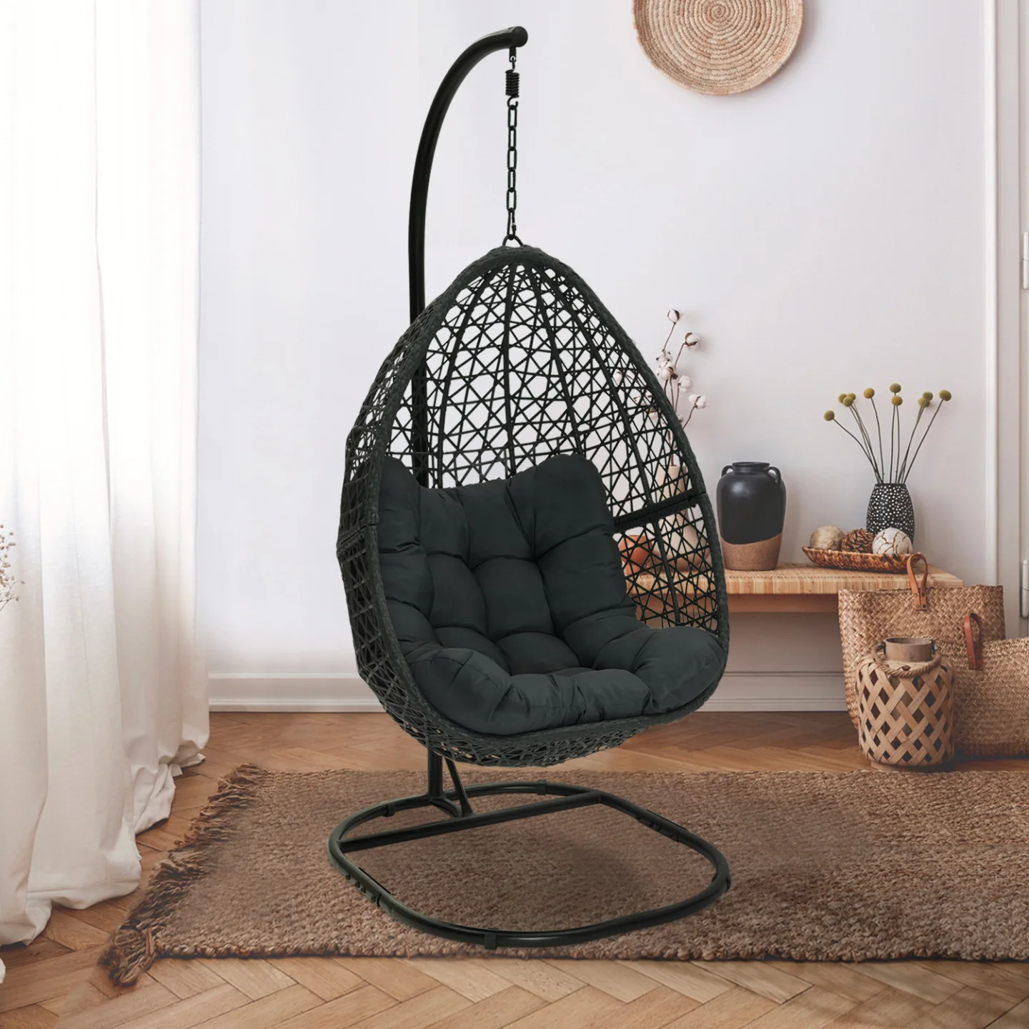 Fauteuil lune suspendu ajouré effet rotin avec coussin gris