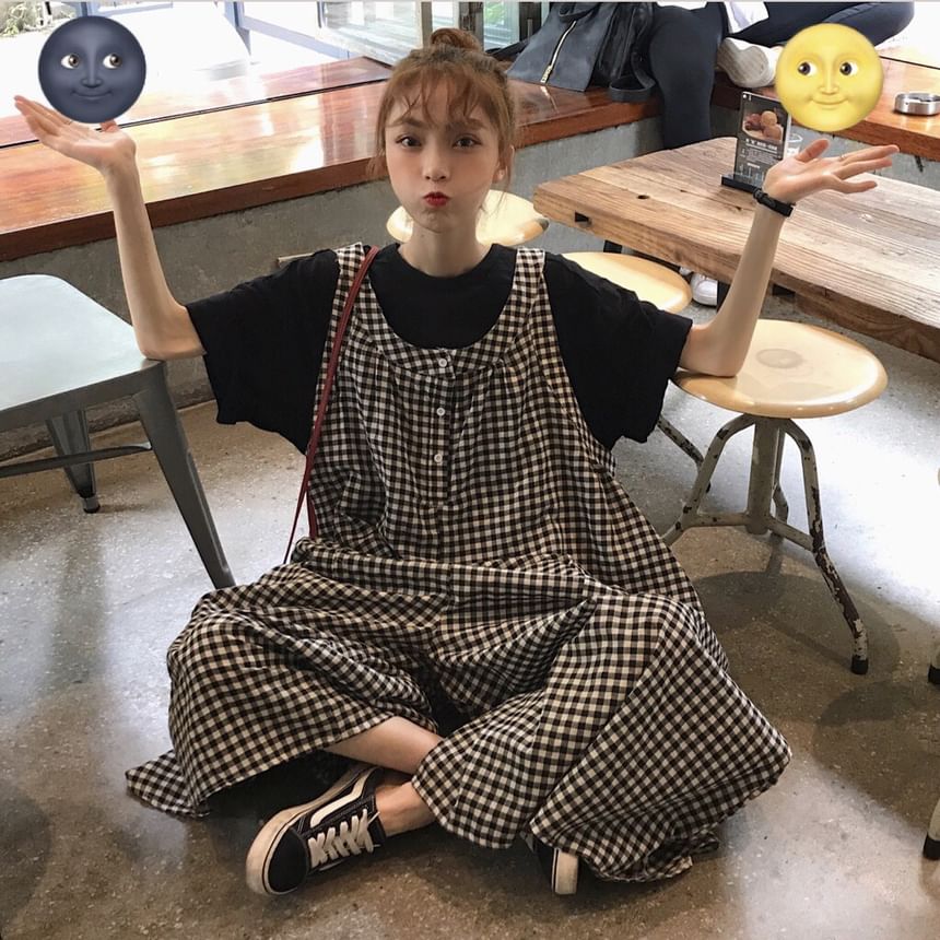 INEN - Mouwloze geruite jumpsuit met wijde pijpen