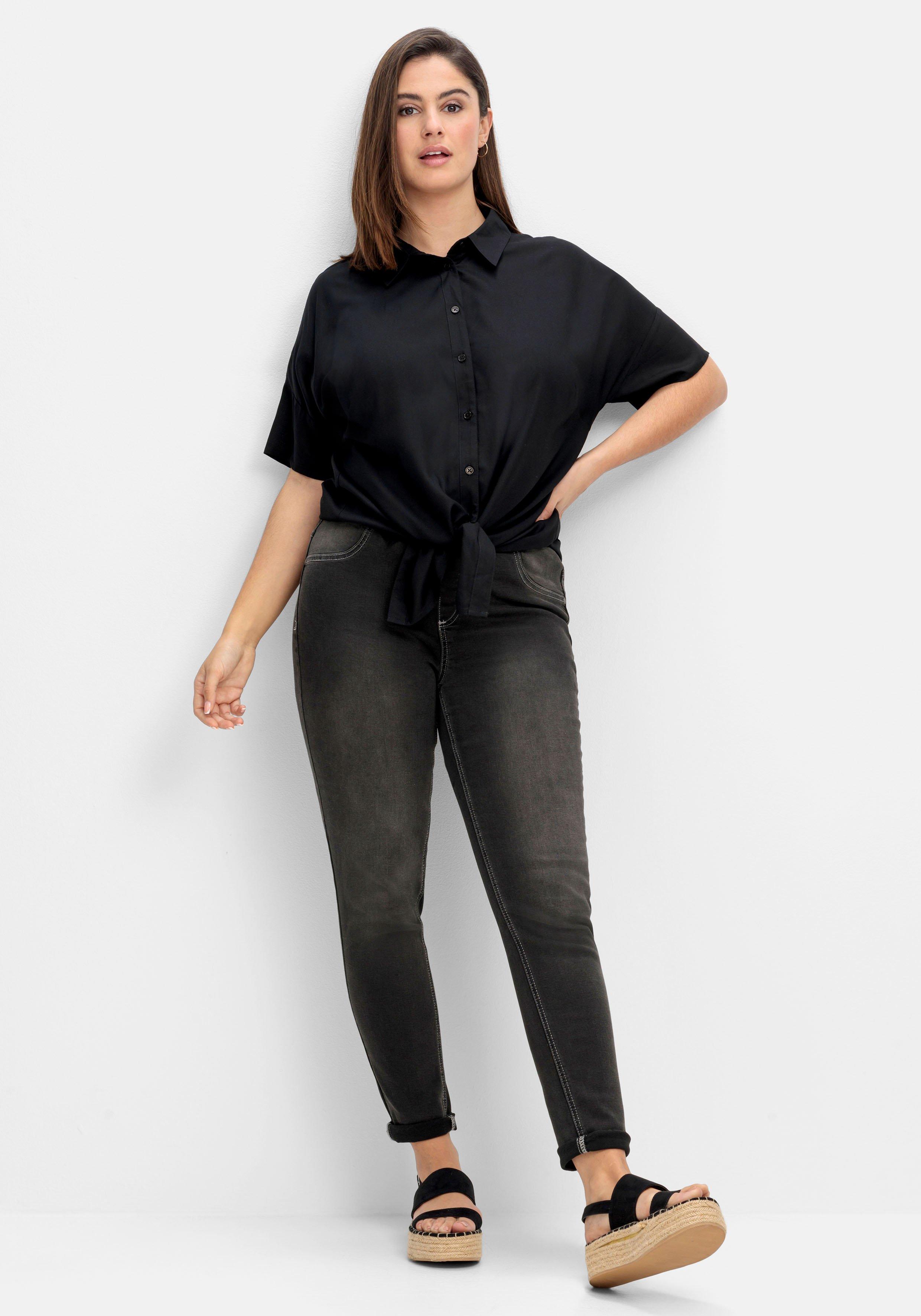Bluse mit überschnittenen Schultern