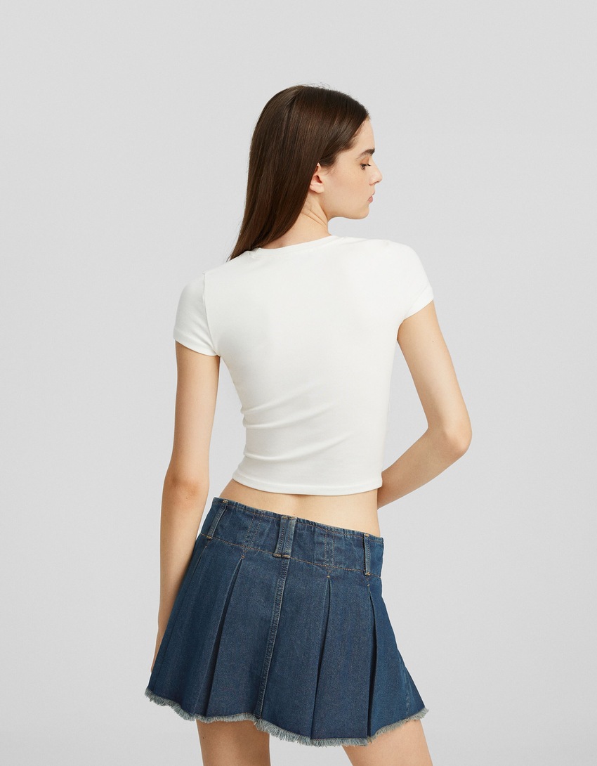 saias-calça plissadas em denim desbotado