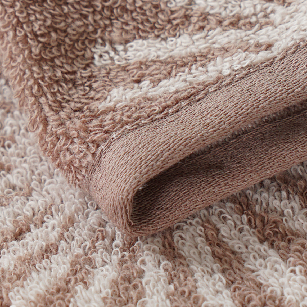 My Home Waschhandschuh mit Sonnen-Muster taupe