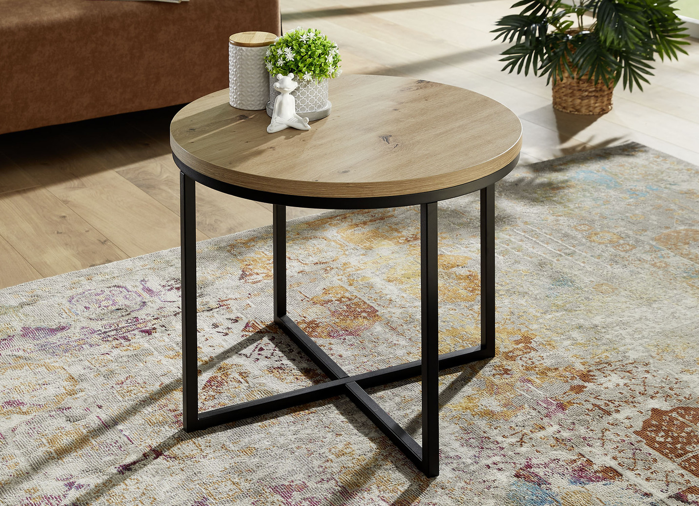 Runder Couchtisch mit schwarzem Metallgestell