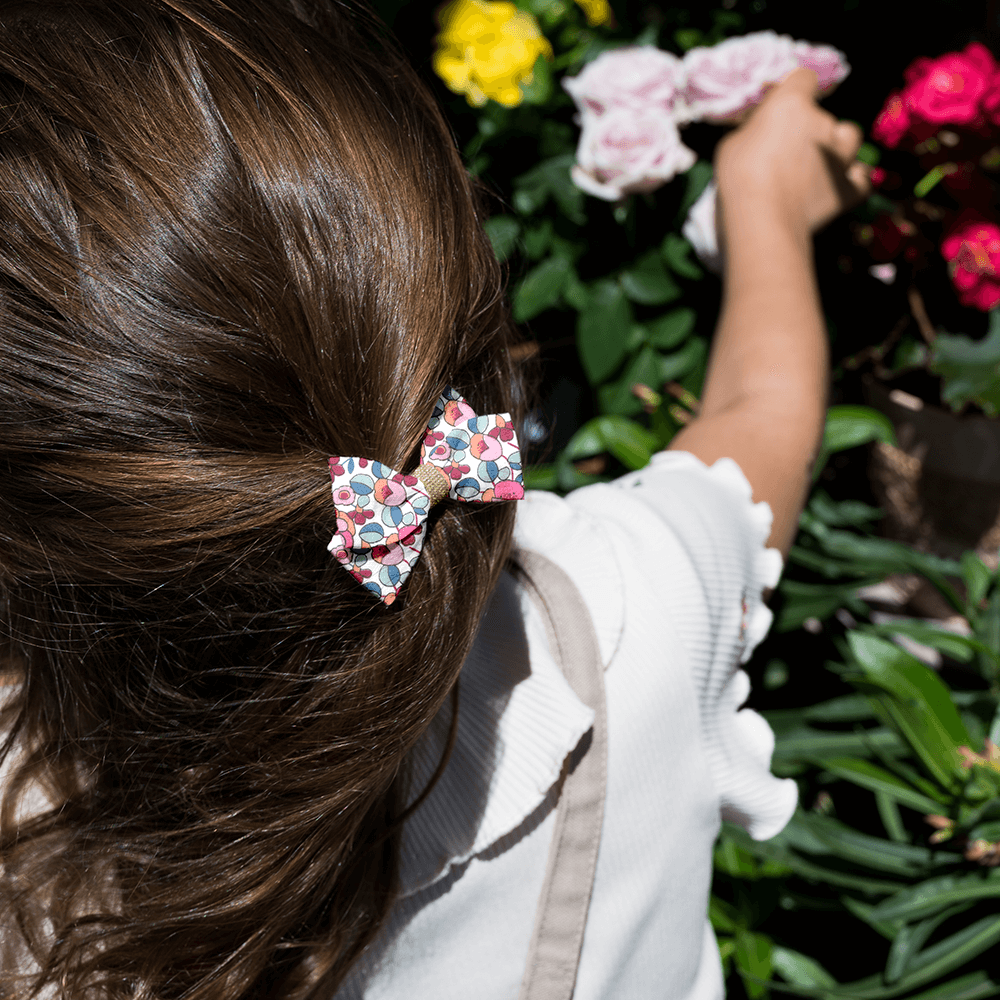 Petite Barrette Double Noeud Croisé Boutons Rose
