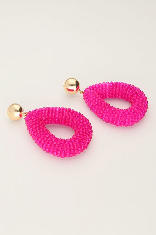 Roze statement oorbellen met steentjes