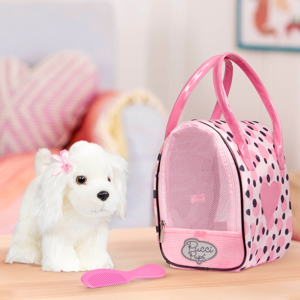 Pucci Pups Malteserwelpe in einer rosa gepunkteten Tasche