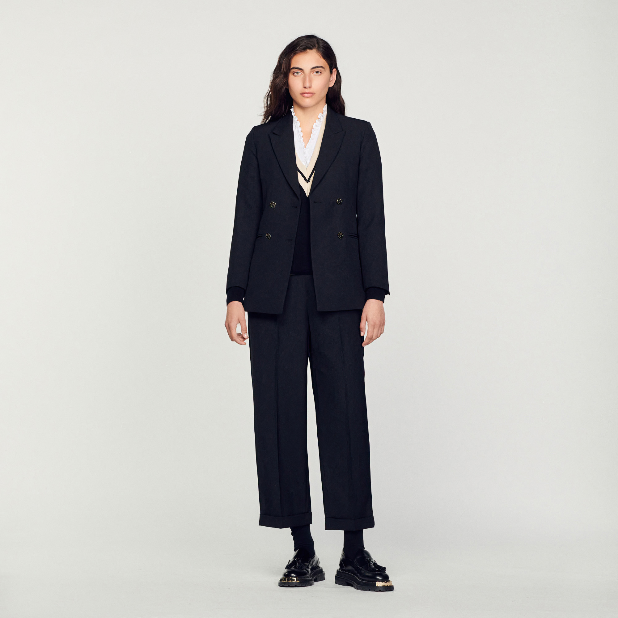 Veste de tailleur á double boutonnage