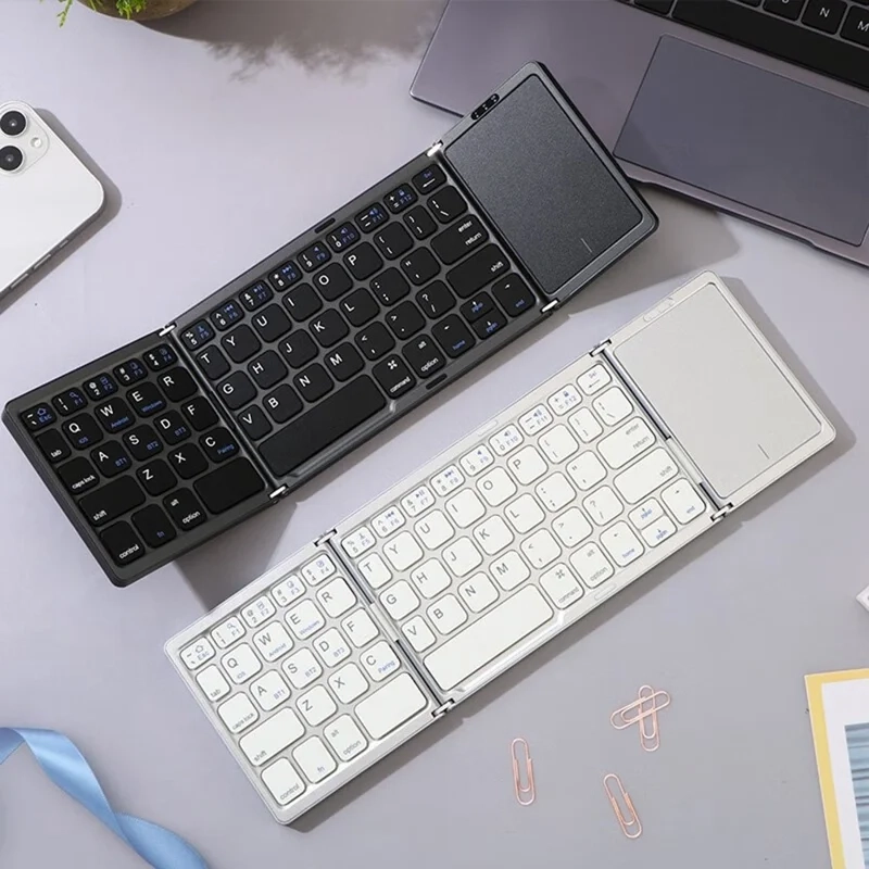 Faltbare Mini Bluetooth Tastatur mit Touchpad für Macbook / Laptop / Tablet / Smartphone inkl. Handy-Halterung (iOS / Android) - Schwarz