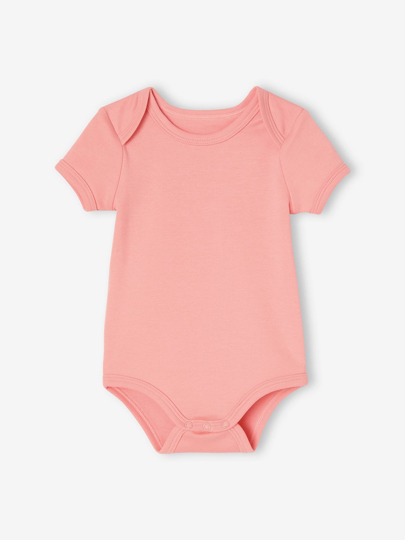 Conjunto de 5 bodies de manga curta para bebês com abertura em formato de margaridas, no estilo americano, na cor rosa claro.