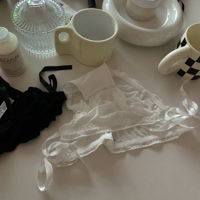 Fenmo - Effen mesh panty met knoopsluiting aan de zijkant