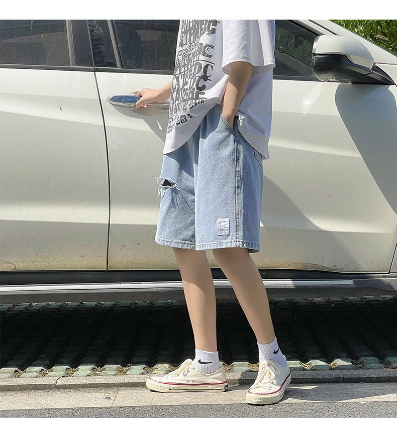 POSI - Uitgesneden denim shorts
