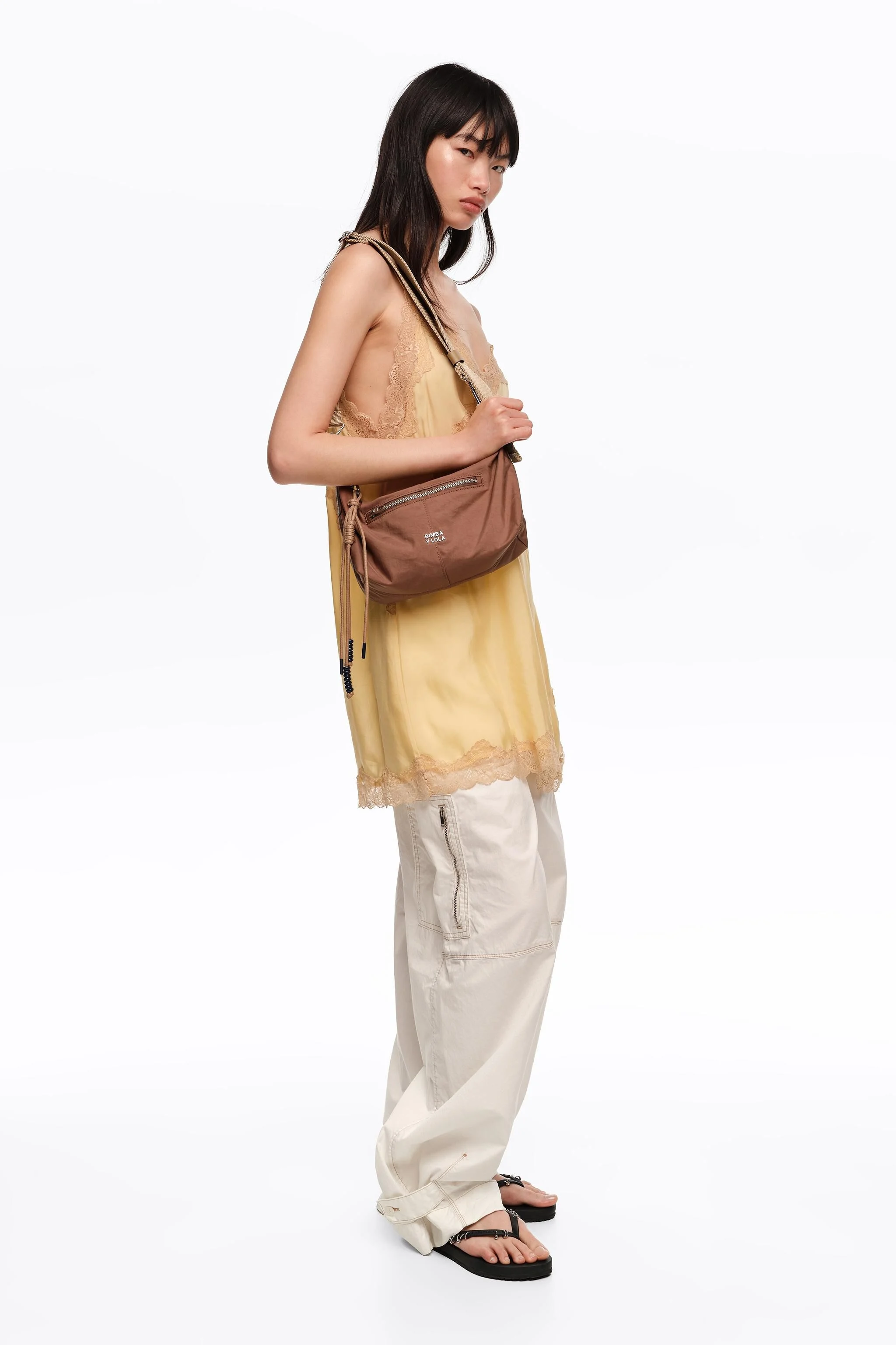 Bolsa pequena Trapecio em náilon bege