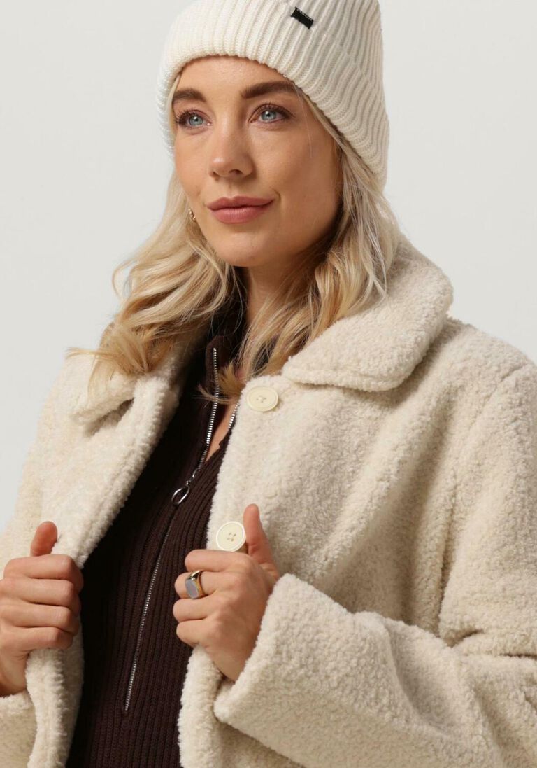 ANOTHER LABEL beige another label faux fur jas moussy coat