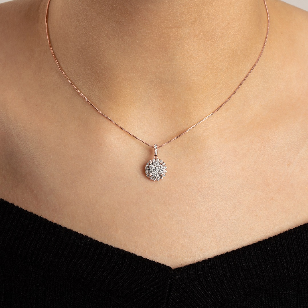 Anhänger 750/18 K Roségold mit Diamanten 0.75 ct H/si by CHRISTIAN