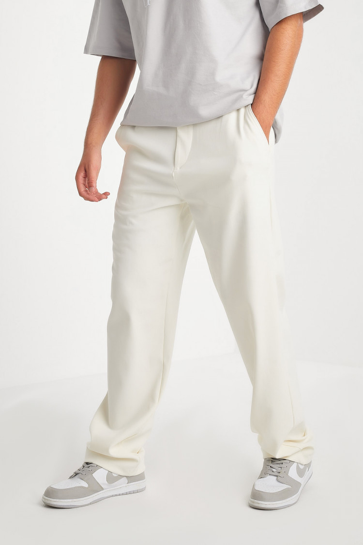 Pantalon écru coupe large