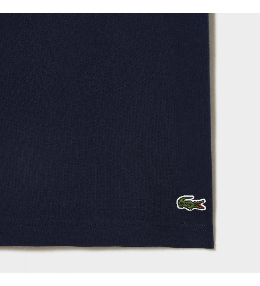 Camiseta Lacoste com logo, tamanho XL, azul marinho.