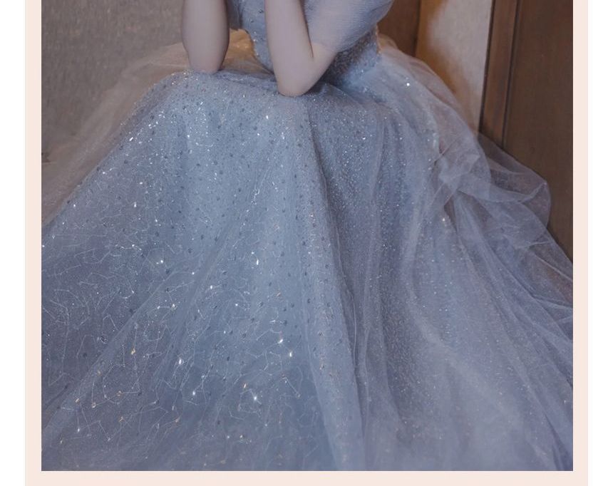 Saunderold - Glitter midi-A-lijn avondjurk met blote schouders