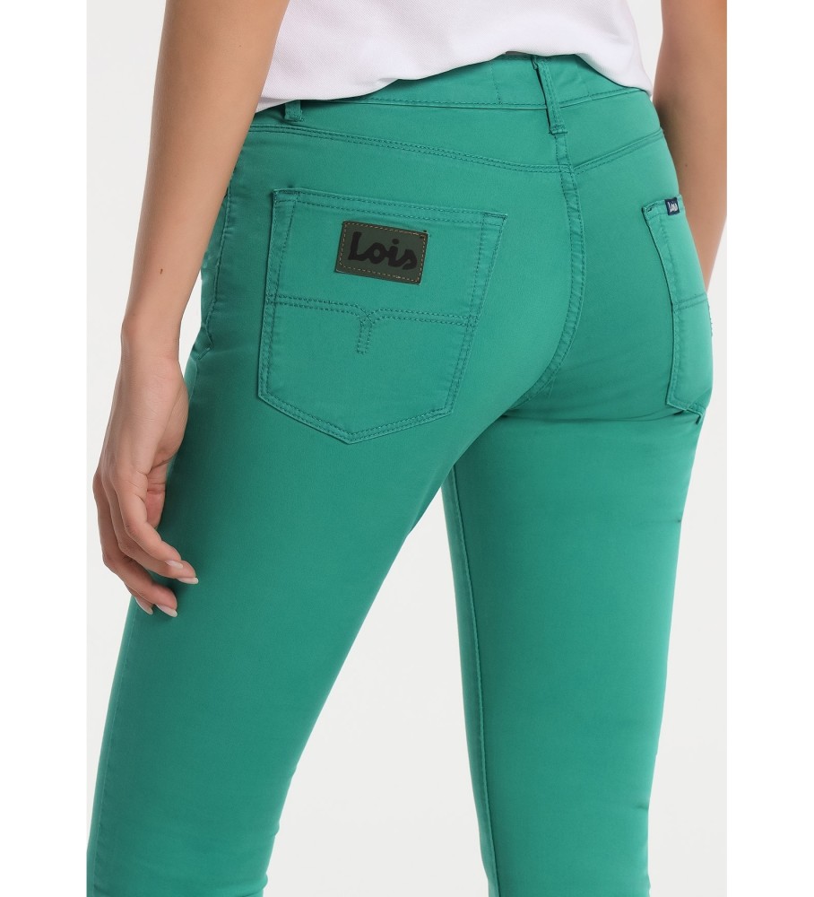 Calça Lois em sarja, cintura alta, corte skinny, verde.