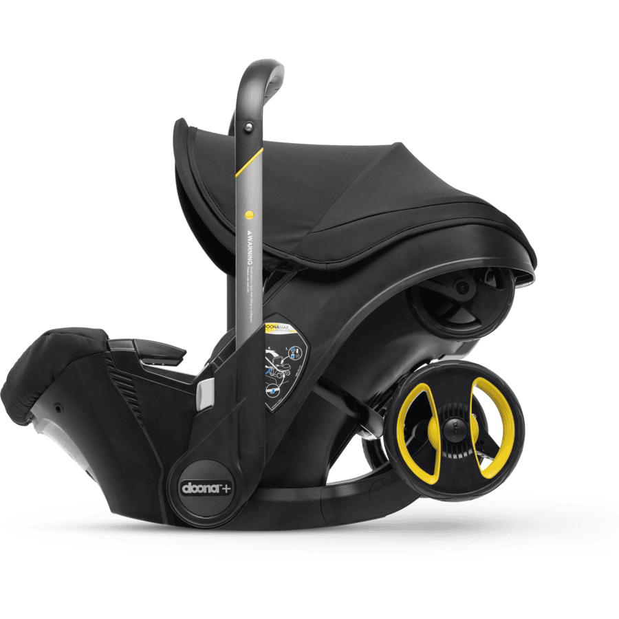 doona Babyschale Nitro Black  schwarz mit voll integriertem Fahrgestell, 2 in 1