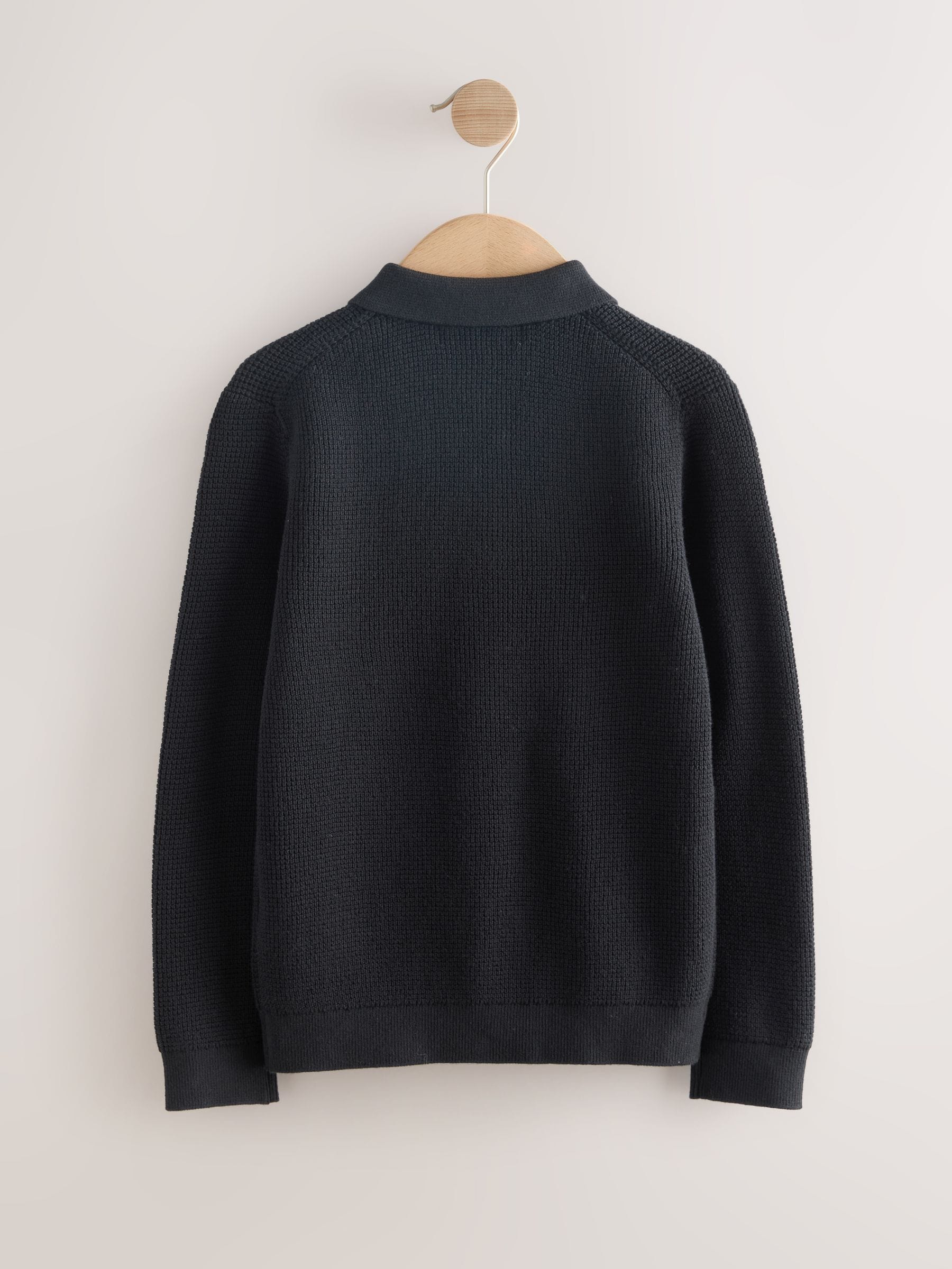 Zwart - Poloshirt met textuur en lange mouwen (3-16jr)