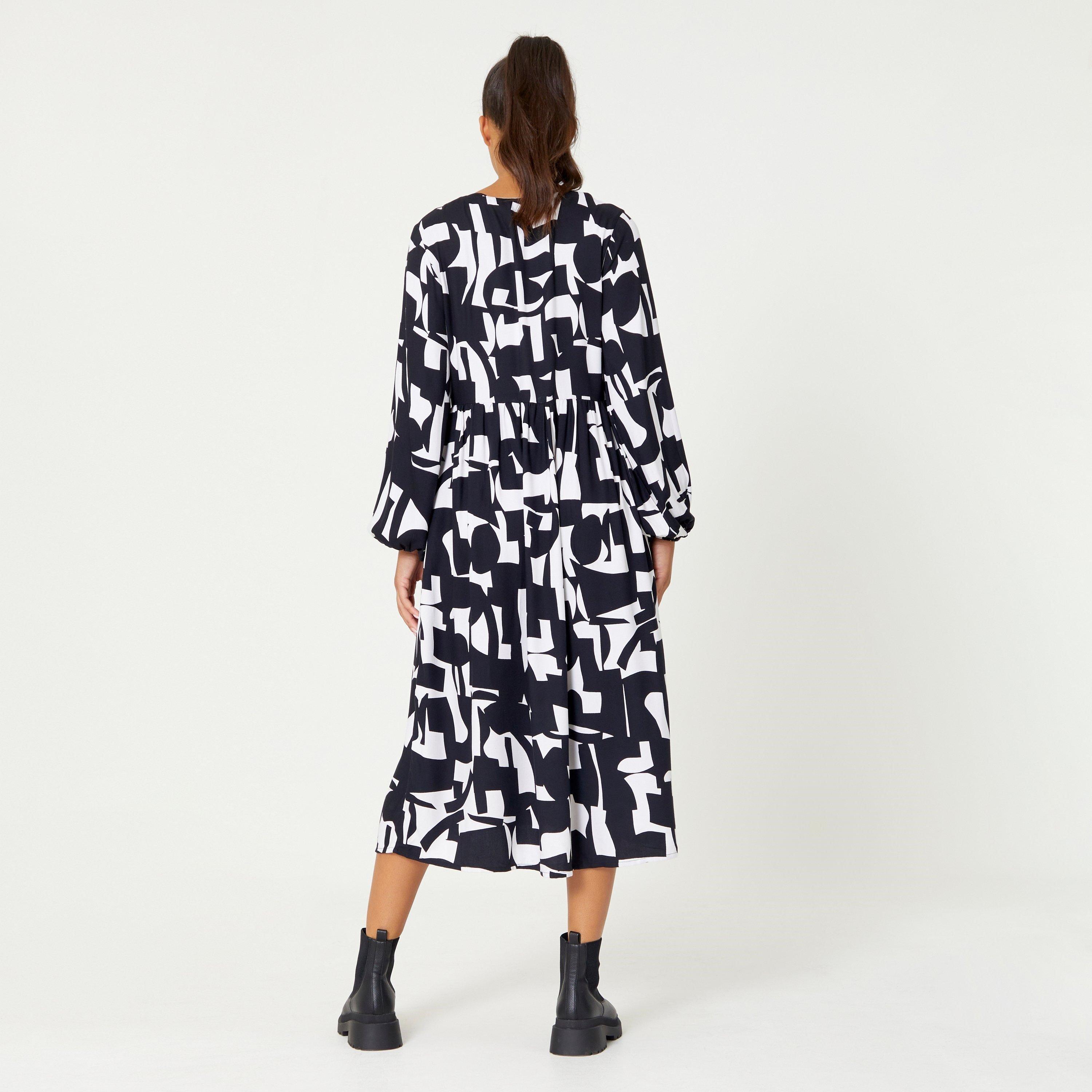 Be You Ladies Mono V Neck Pocket Midi Dress