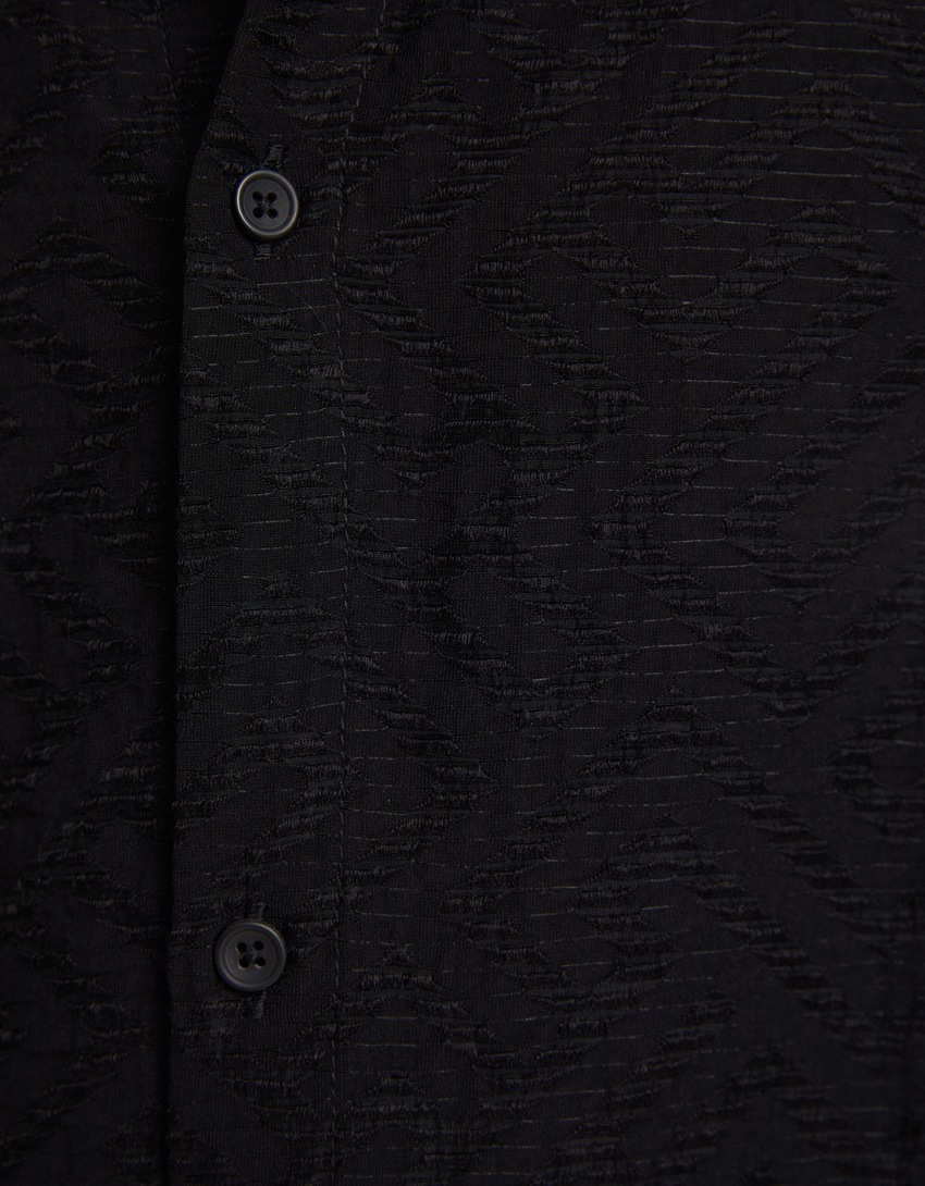 Camisa de manga comprida com detalhes vazados