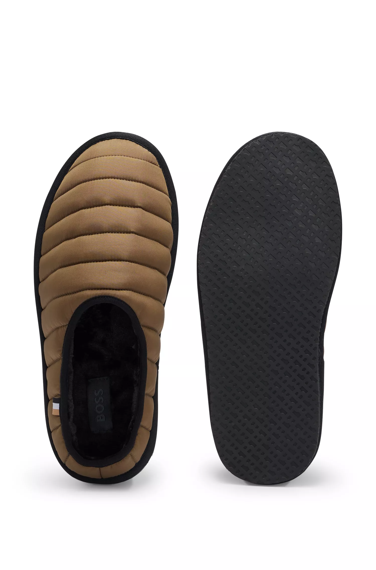 Pantufas BOSS pretas acolchoadas em nylon com sola de borracha.