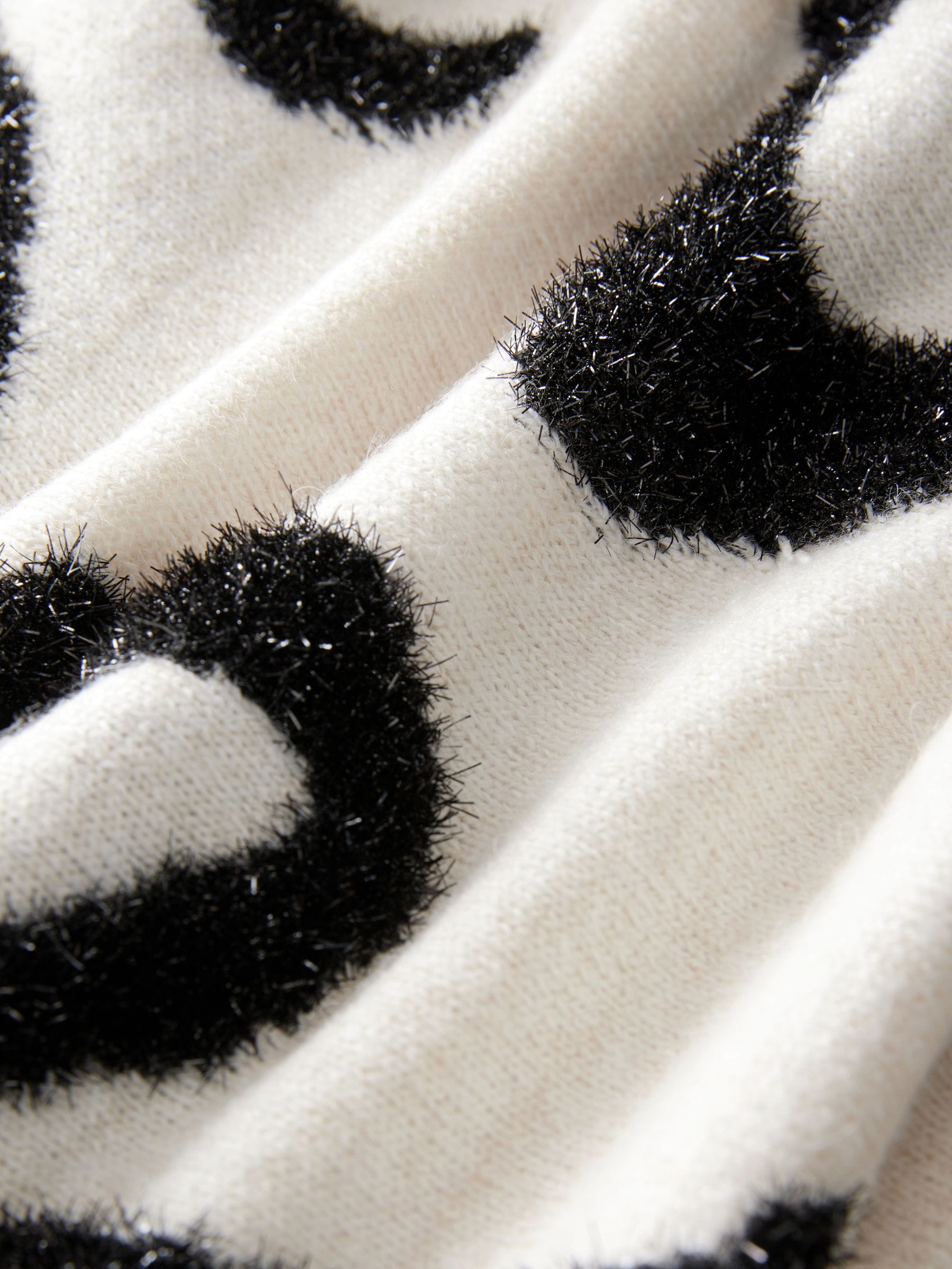 Witte en zwarte strik van metallic garen - Gebreide kersttrui