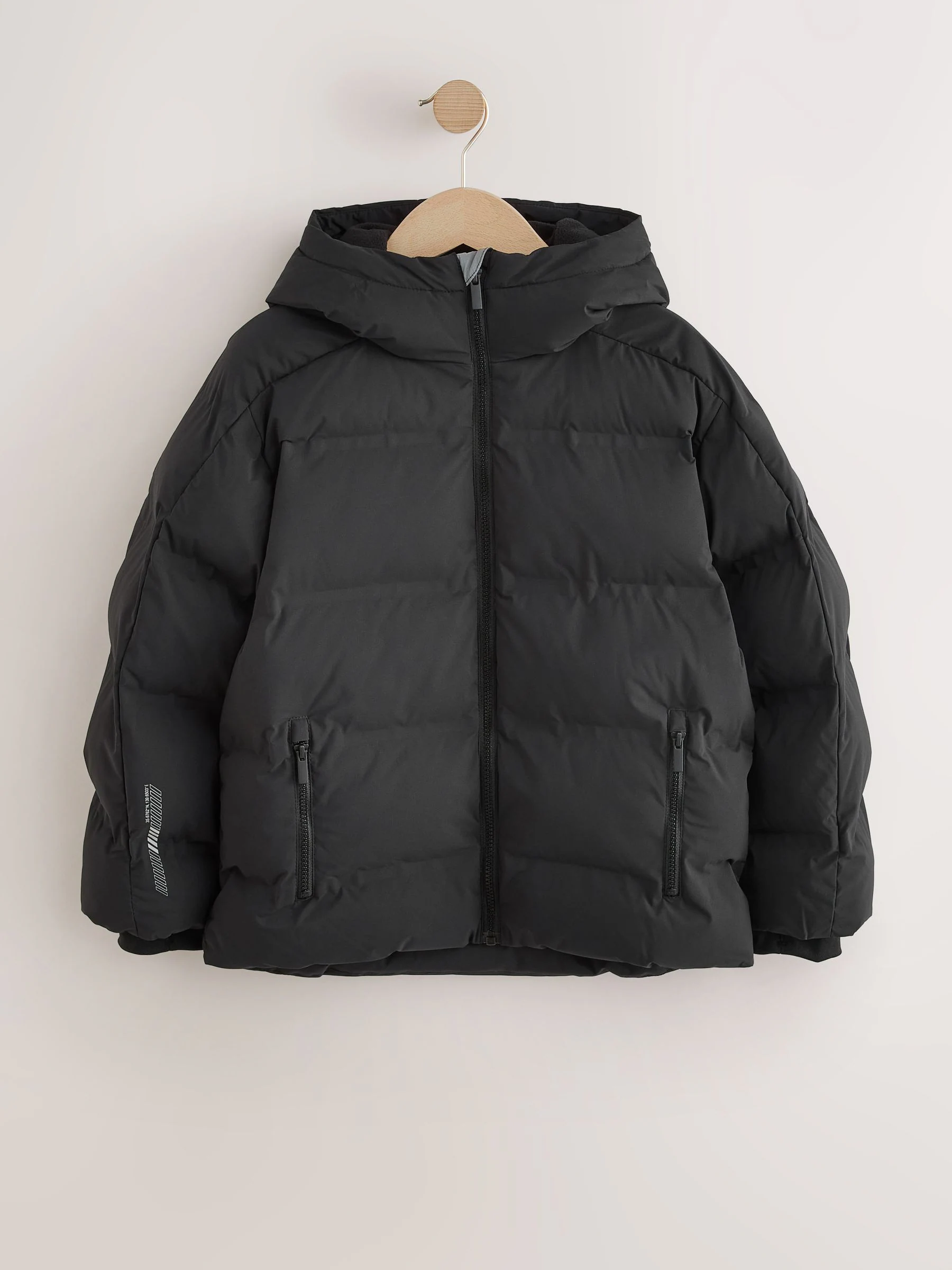 Zwart - Regenbestendige gewatteerde jas met microfleece voering (3-17jr)