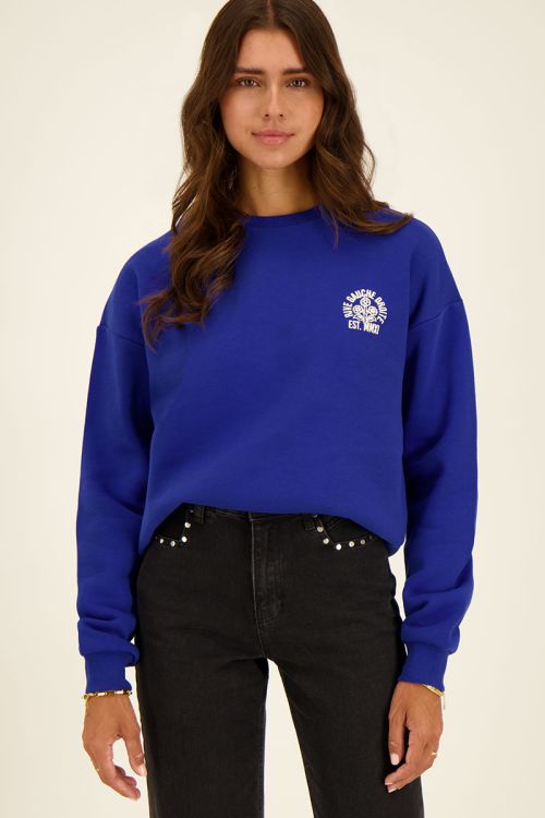 Blauwe sweater rive gauche droite