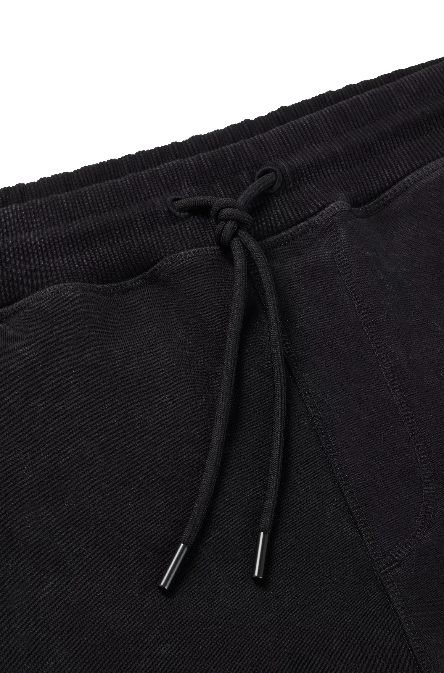 Calça de fato de treino BOSS laranja, corte descontraído, em algodão, com detalhes inspirados no automobilismo.