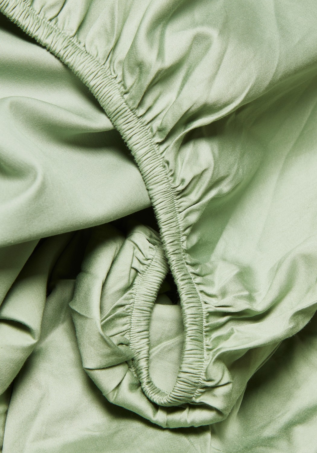 Storyfabrics Fixleintuch Satin Eisberggrün
