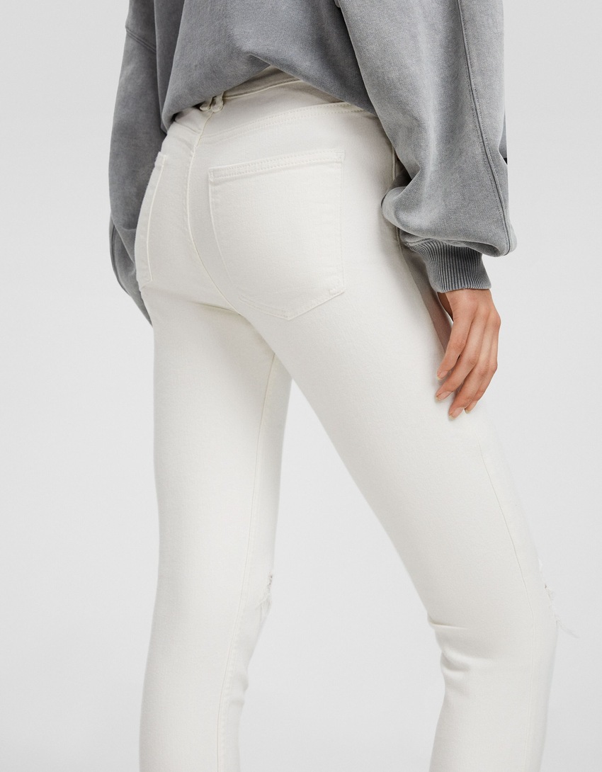 calça jeans skinny vintage de cintura baixa