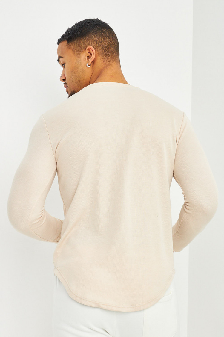 Pull côtelé beige manches longues