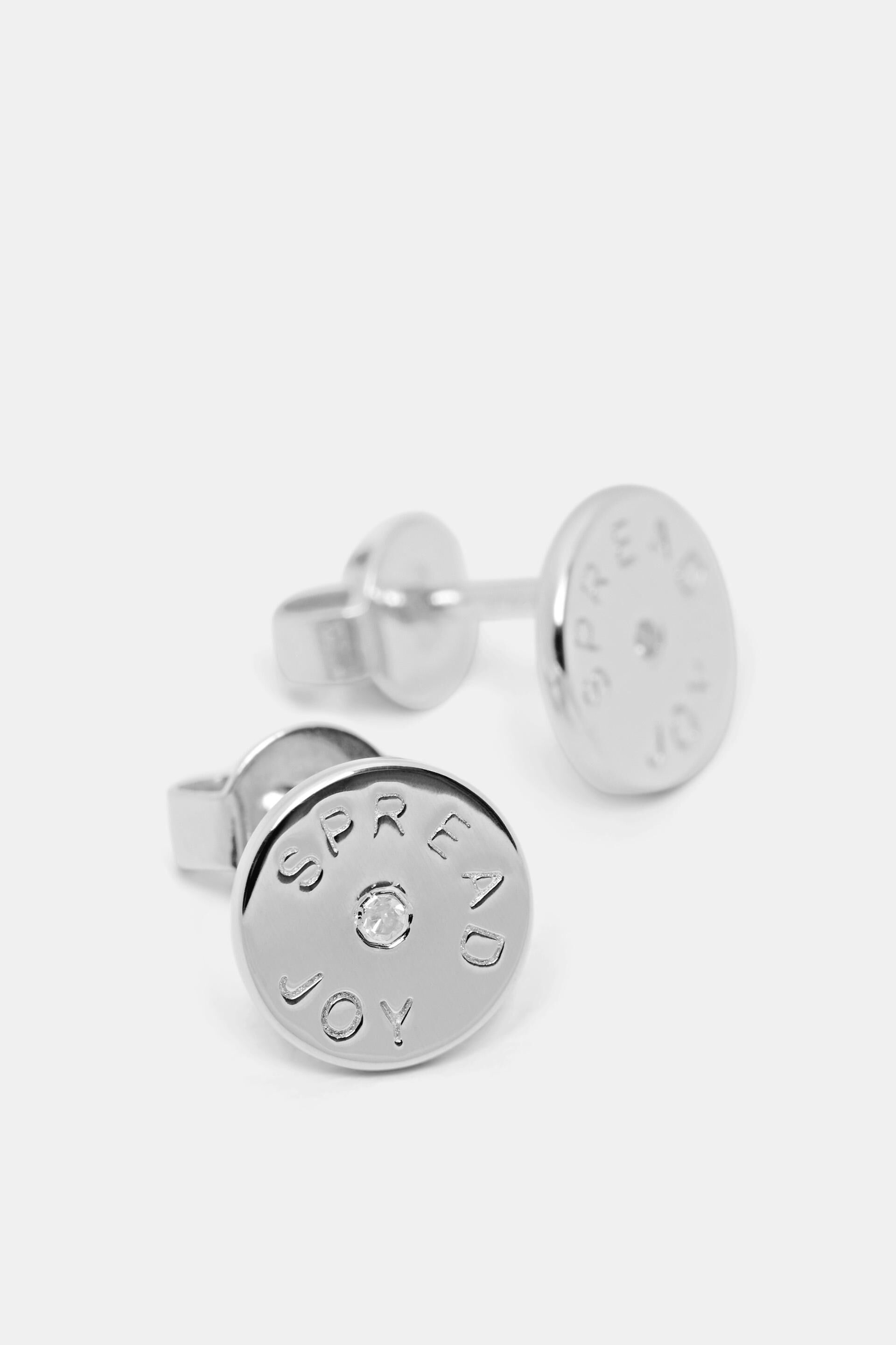 Clous d’oreilles ornés d’un diamant, argent sterling